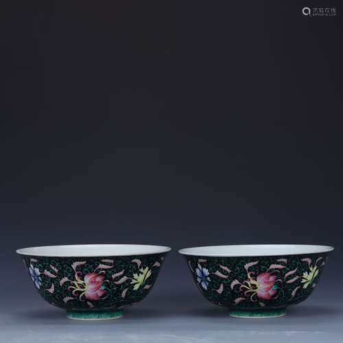 A Black-Ground Famille Rose Floral Bowls