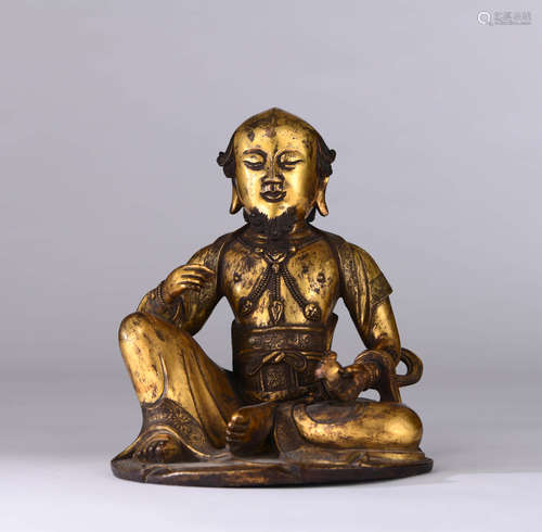 A Gilt Bronze Statue Of Buddha