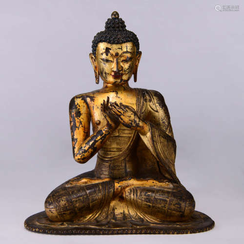 A Gilt Bronze Statue Of Buddha