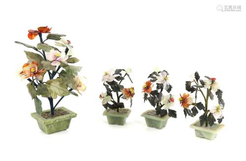 Four Chinese hardstone flower groups, largest 22cm high, (4)...