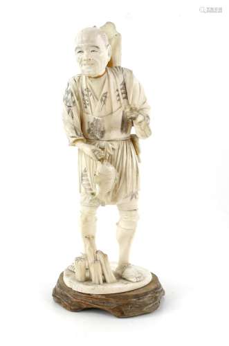 Early 20th century Japanese carved ivory figure of a fisherm...