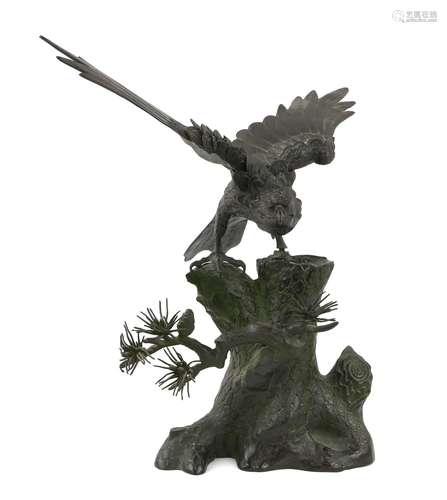 20th century Japanese cast bronze eagle alighting on a pine ...