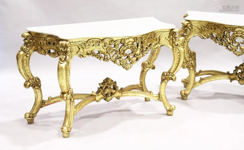 A PAIR OF GILDED AND MARBLE TOP CONSOLE TABLES with