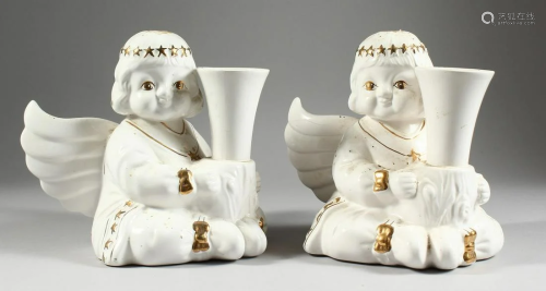 A PAIR OF GILDED ANGEL SPILL VASES, 6 in. high.