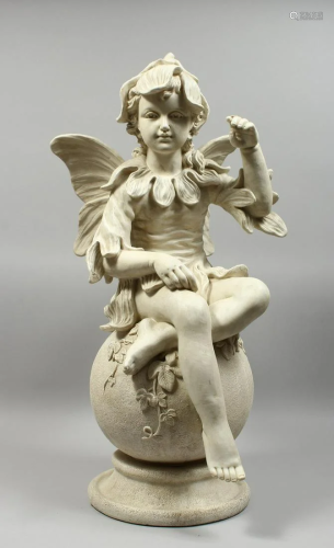 A POTTERY FIGURE OF A FAIRY on a circular base, 32 in.