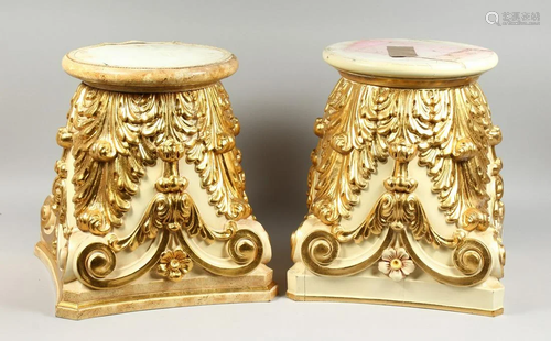 A GOOD PAIR OF CREAM AND GILDED STANDS with circular