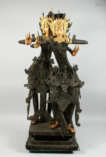 A THAI GROUP OF TWO DANCING FIGURES MODELLED FROM