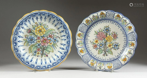 TWO POTTERY DISHES painted with flowers, 13 in.
