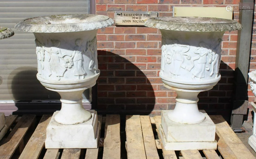 A SUPERB NEAR PAIR OF ITALIAN CARVED WHITE MARBLE URNS