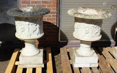 A SUPERB NEAR PAIR OF ITALIAN CARVED WHITE MARBLE URNS