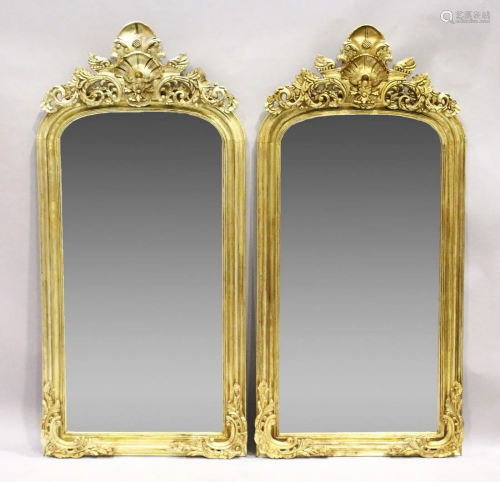 A PAIR OF GILT RECTANGULAR UPRIGHT MIRRORS with scroll