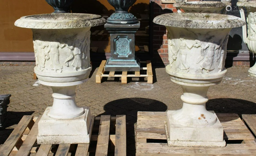 A SUPERB NEAR PAIR OF ITALIAN CARVED WHITE MARBLE URNS