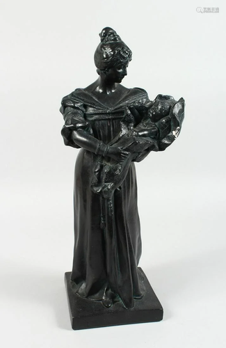 A POTTERY BRONZED MOTHER AND CHILD 19 ins. high.