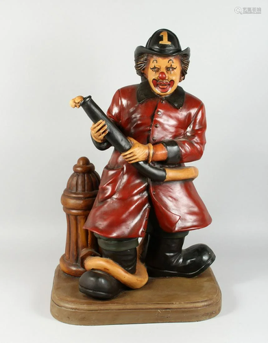 A COMPOSITION CLOWN FIREMAN, 2ft 6 ins high