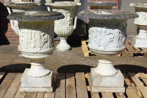 A SUPERB NEAR PAIR OF ITALIAN CARVED WHITE MARBLE URNS