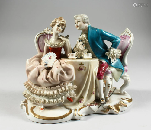 A CONTINENTAL PORCELAIN GROUP GALLANT AND LADY, 8 ins.