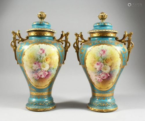 A PAIR OF GERMAN BONN TWO HANDLED VASES with blue and