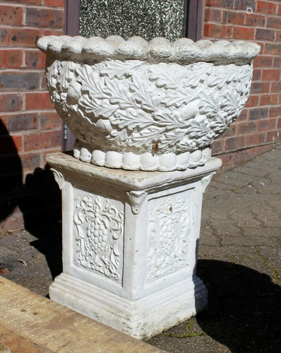 A CIRCULAR GARDEN POT, the sides with acorns 1 ft 9