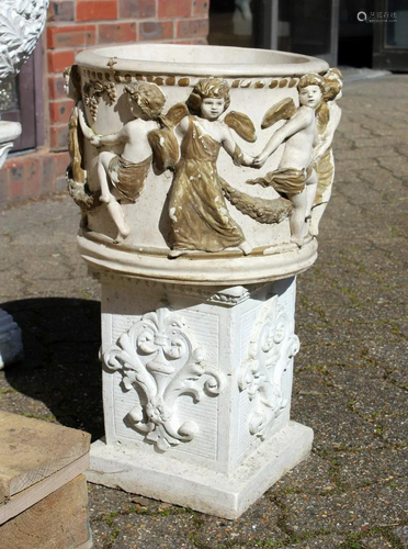 A CIRCULAR GARDEN POT, the sides with classical figures