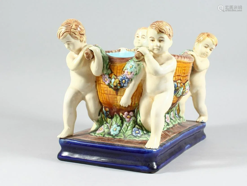 A MAJOLICA MINTON DESIGN POTTERY PLATTER with four