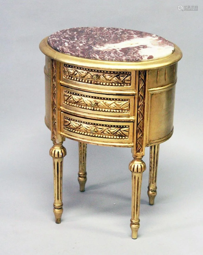 A FRENCH STYLE GILT WOOD THREE DRAWER OVAL CHEST, with