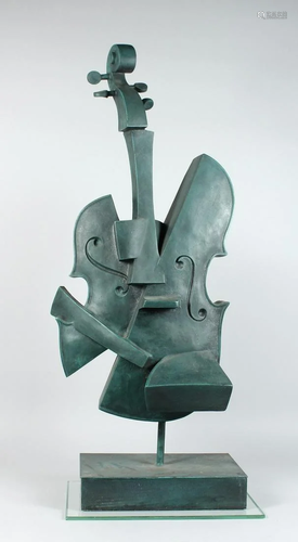 AN ABSTRACT BRONZE CELLO on an rectangular base 34 ins