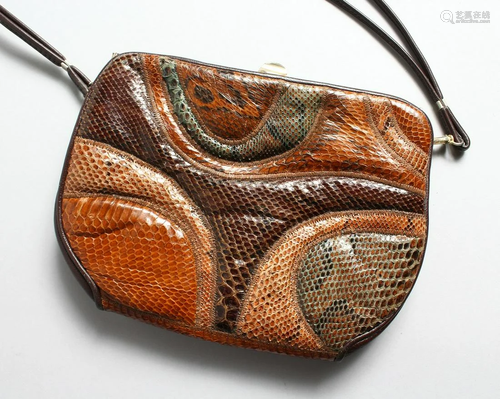 A SNAKESKIN AND LEATHER DESIGNER BAG 10 ins long