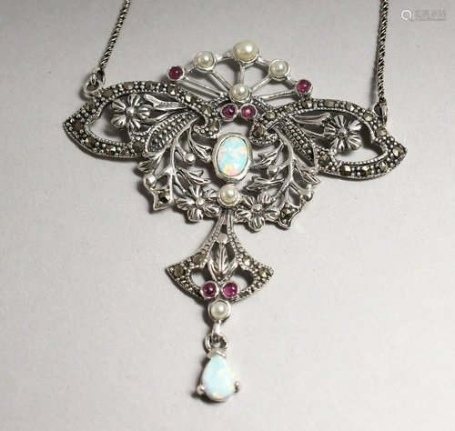 A SILVER AND OPAL PENDANT ON A CHAIN