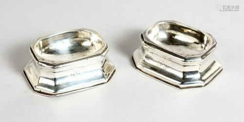 A PAIR OF GEORGE I SILVER TRENCHER SALTS 3 ins high,