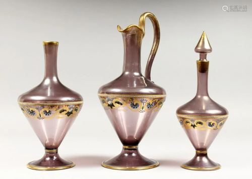 A VENETIAN AMETHYST TINTED GLASS EWER, with gilt and