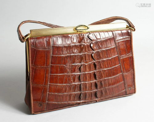 A CROCODILE AND LEATHER DESIGNER BAG 10.5 ins long