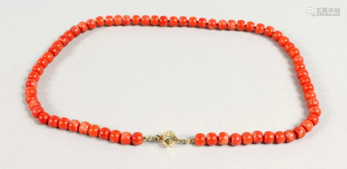 A CORAL NECKLACE with gold clasp