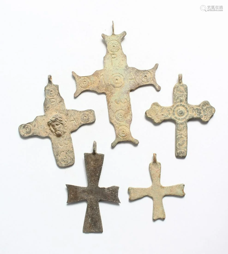 FIVE MEDIUM ROMAN CAST IRON CRUCIFIXES