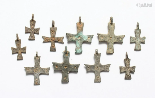 TEN SMALL ROMAN CAST IRON CRUCIFIXES