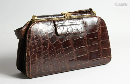 A CROCODILE AND LEATHER DESIGNER BAG 12 ins long