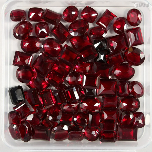 A BOX OF GARNET STONES