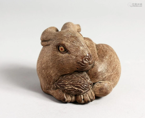 A CHINESE CARVED WOOD RABBIT 2.5 ins