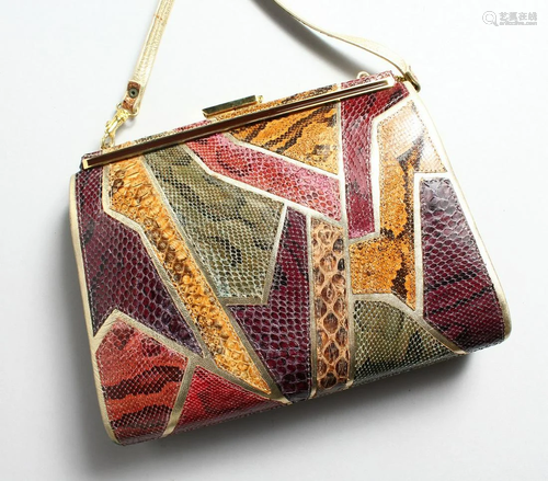 A SNAKESKIN AND LEATHER DESIGNER BAG 9 ins long