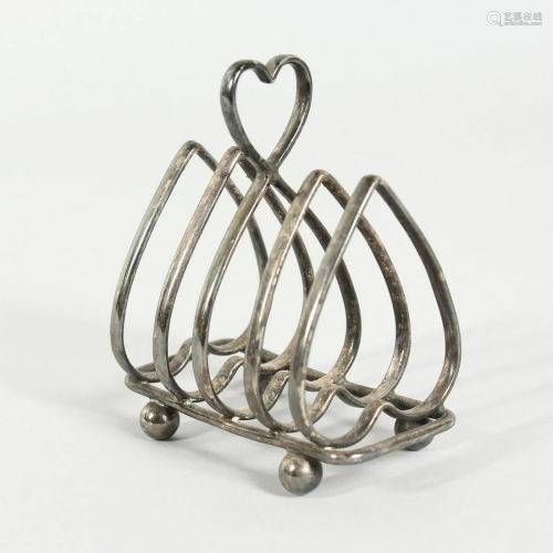 A HEART SHAPED TOAST RACK, FOUR PIN BOTTLES, 2 with
