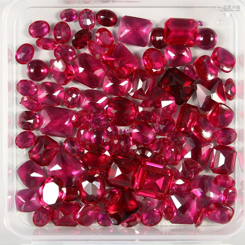 A BOX OF RUBY BUFF STONES