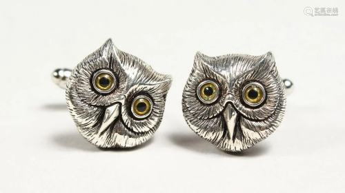 A PAIR OF SILVER OWL FACE CUFF LINKS