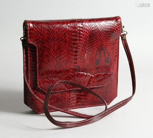 A SNAKE LEATHER DESIGNER BAG 8 ins long