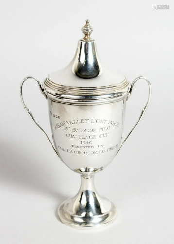 A POLO TROPHY, TWO HANDLED CUP AND COVER, 6.5 INS…