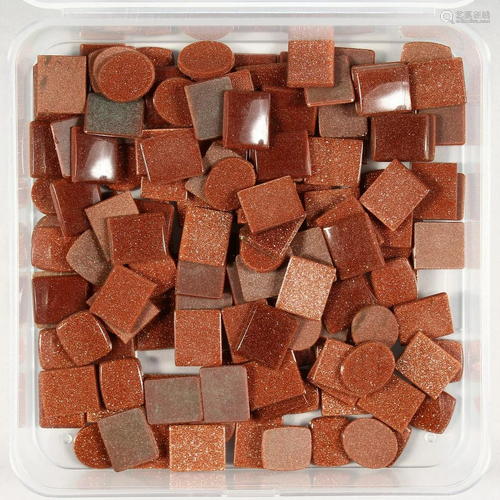 A BOX OF GOLDSTONE STONES