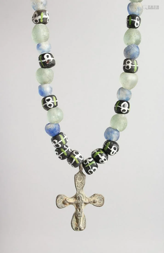 A ROMAN BEAD AND CROSS NECKLACE