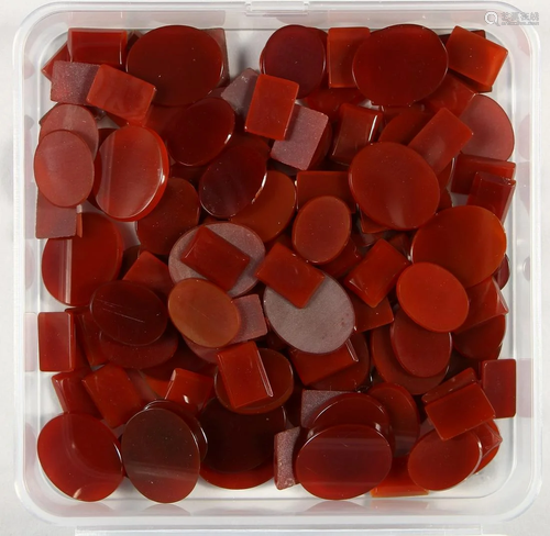 A BOX OF CORNELIAN STONES