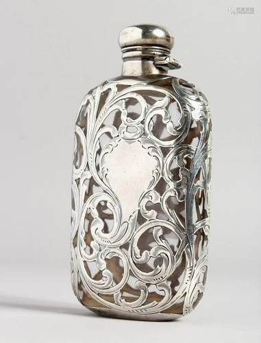 A GOOD GLASS AND PIERCED SILVER WHISKY FLASK with