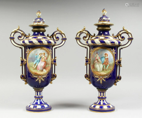 A SUPERB LARGE PAIR OF SEVRES TWO HANDLED VASES AND
