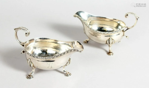A PAIR OF GEORGE III SILVER SAUCE BOATS, with rope edge
