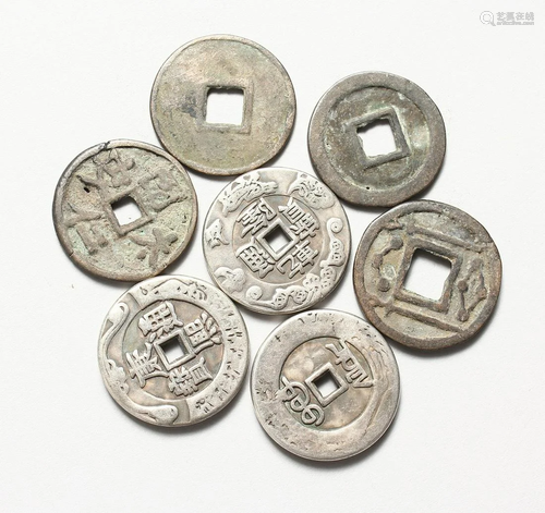 SEVEN CHINESE SILVER COINS